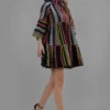 Model wearing handmade multicolor cotton lurex jacquard mini dress with flared sleeves