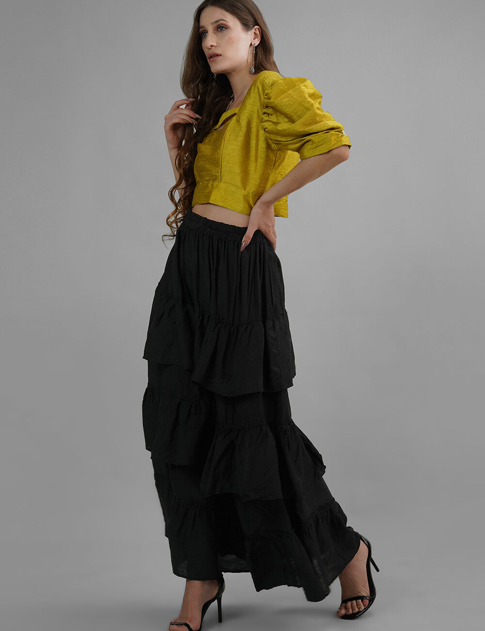 Model in mustard yellow puff sleeve Dhupian silk top with square neckline