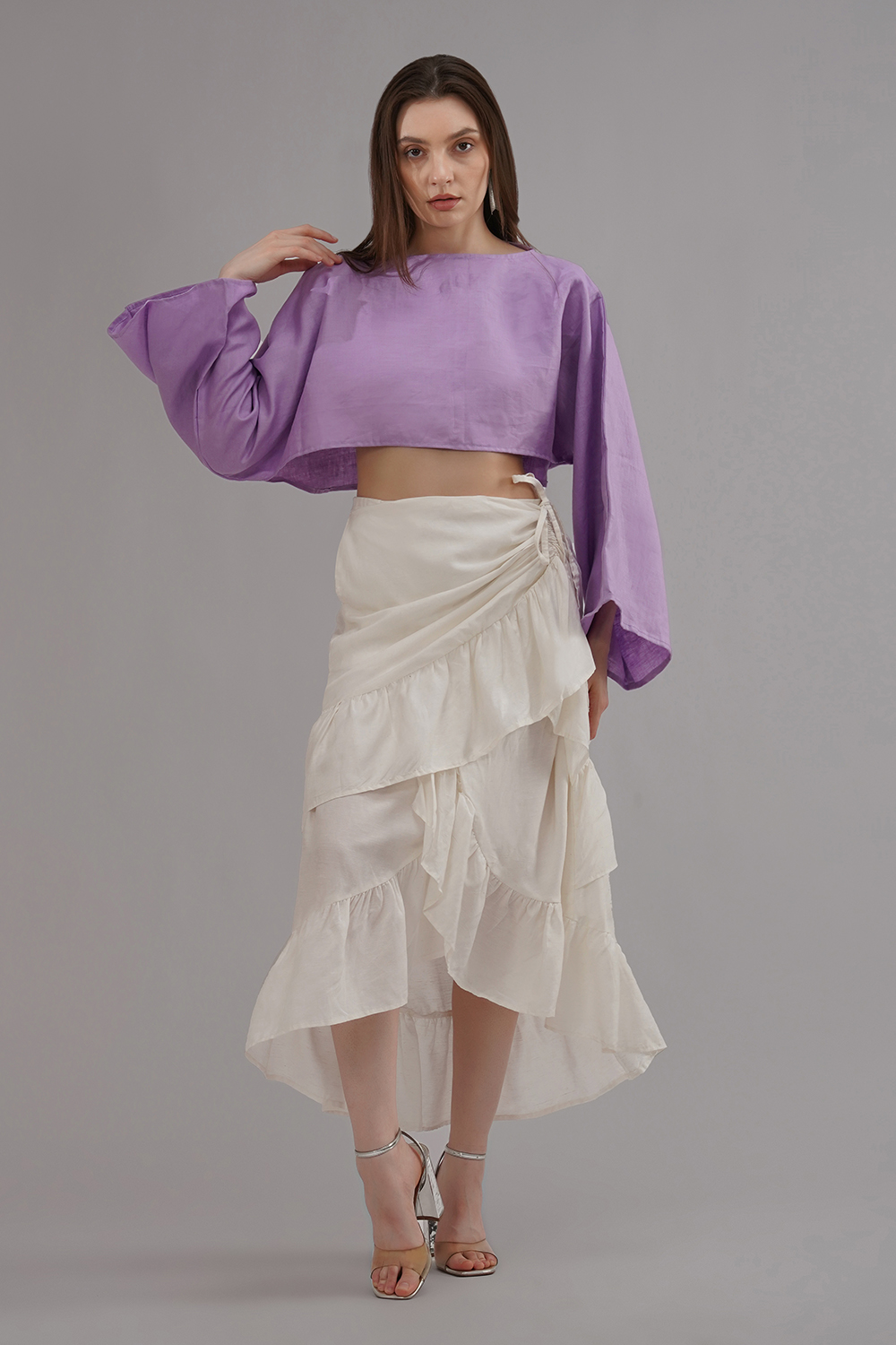 Model wearing lilac oversized cropped cotton linen top