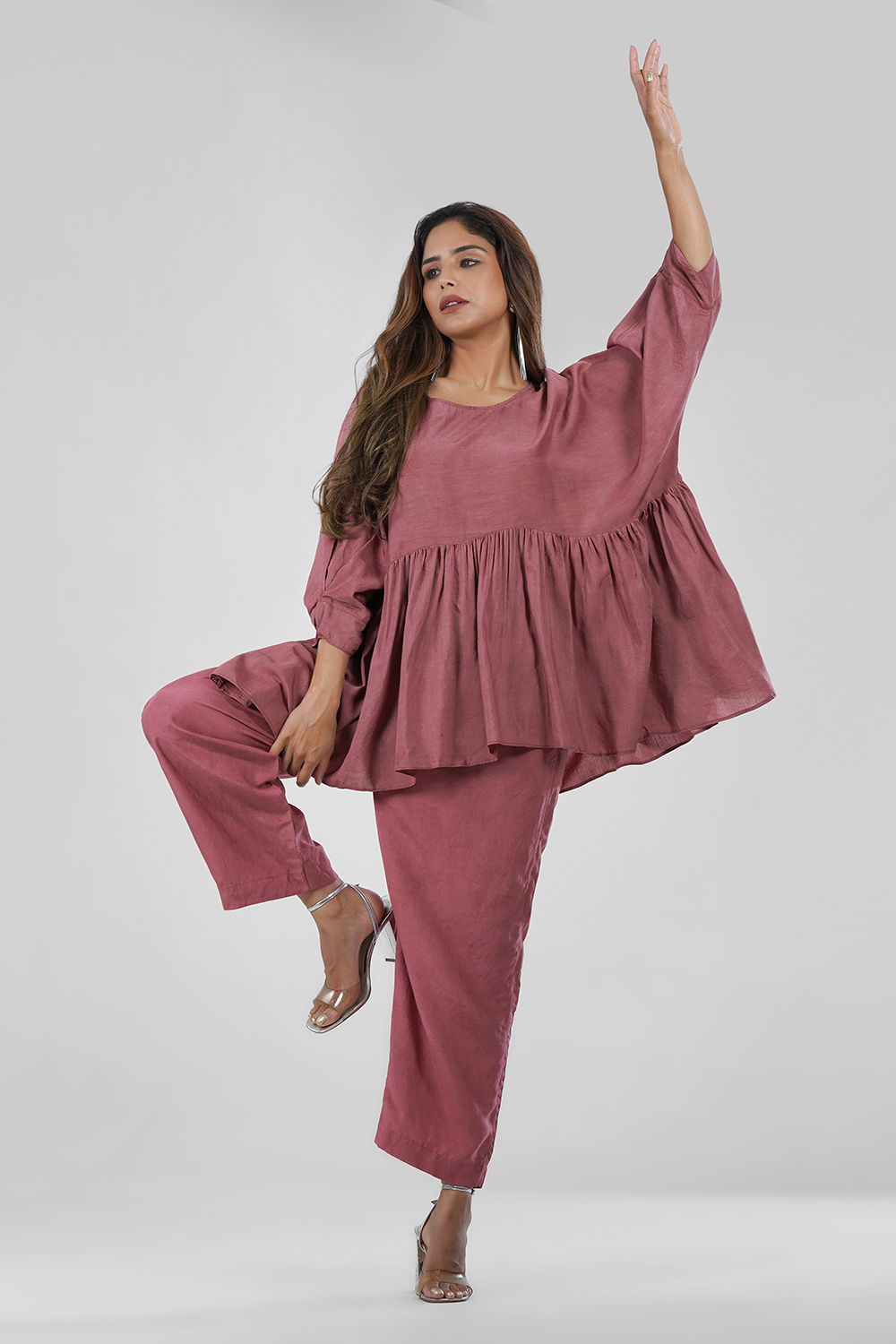 Model wearing dusty rose cotton-linen co-ord set with shimmer finish